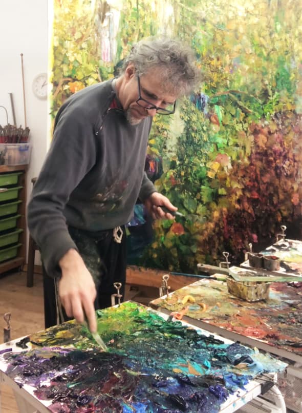 Dan Voinea painting in the studio